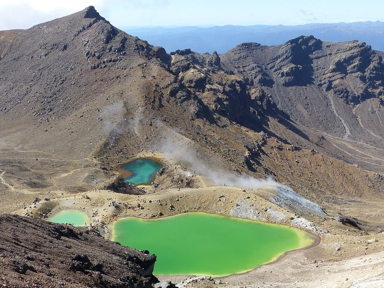 The vivid Emerald Lakes gleaming in the Tongariro volcanic crater, viewed from above on the Tongariro Alpine Crossing, New Zealand