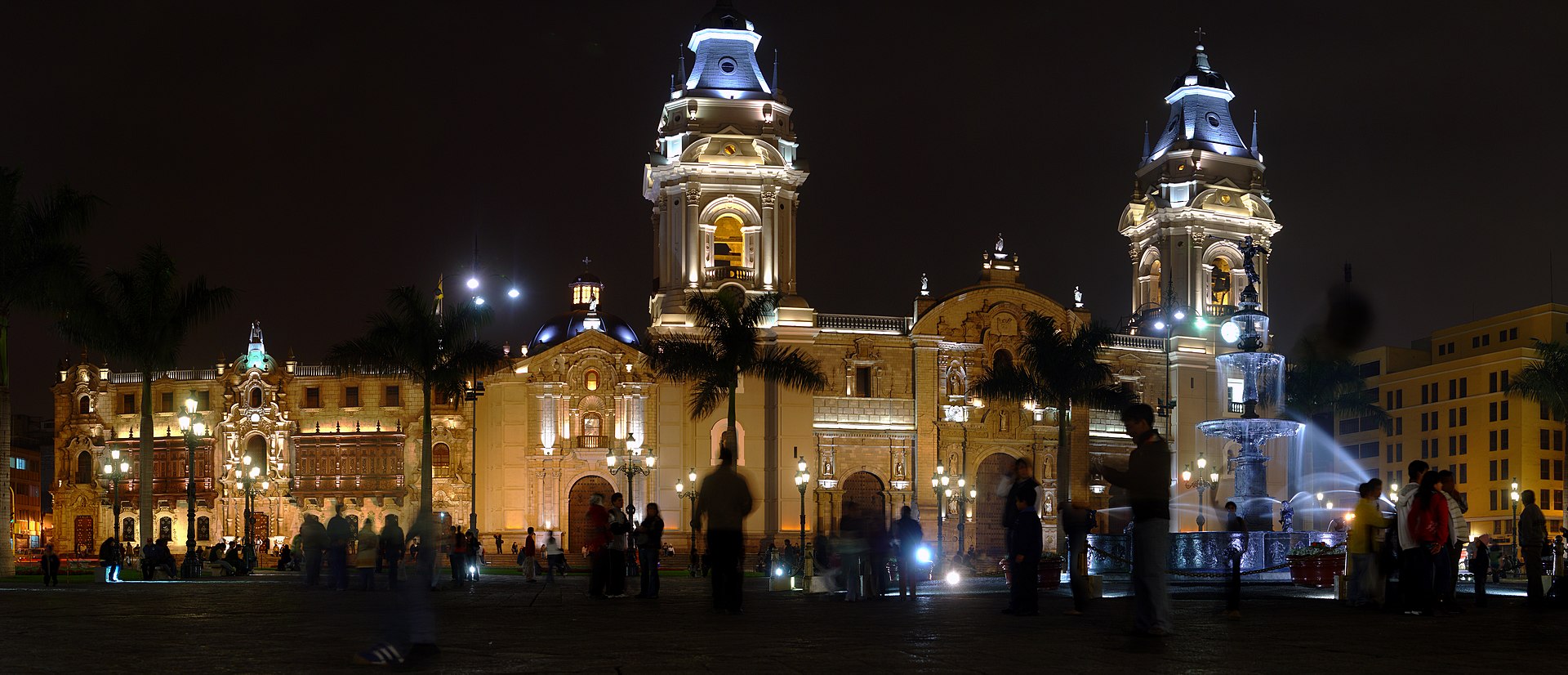 Panoramic view of Lima's Plaza Mayor with the Cathedral of Lima, Government Palace, and central fountain