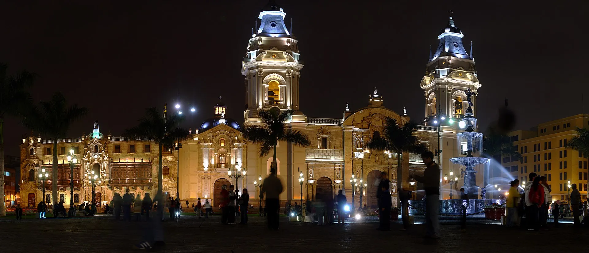 Panoramic view of Lima's Plaza Mayor with the Cathedral of Lima, Government Palace, and central fountain