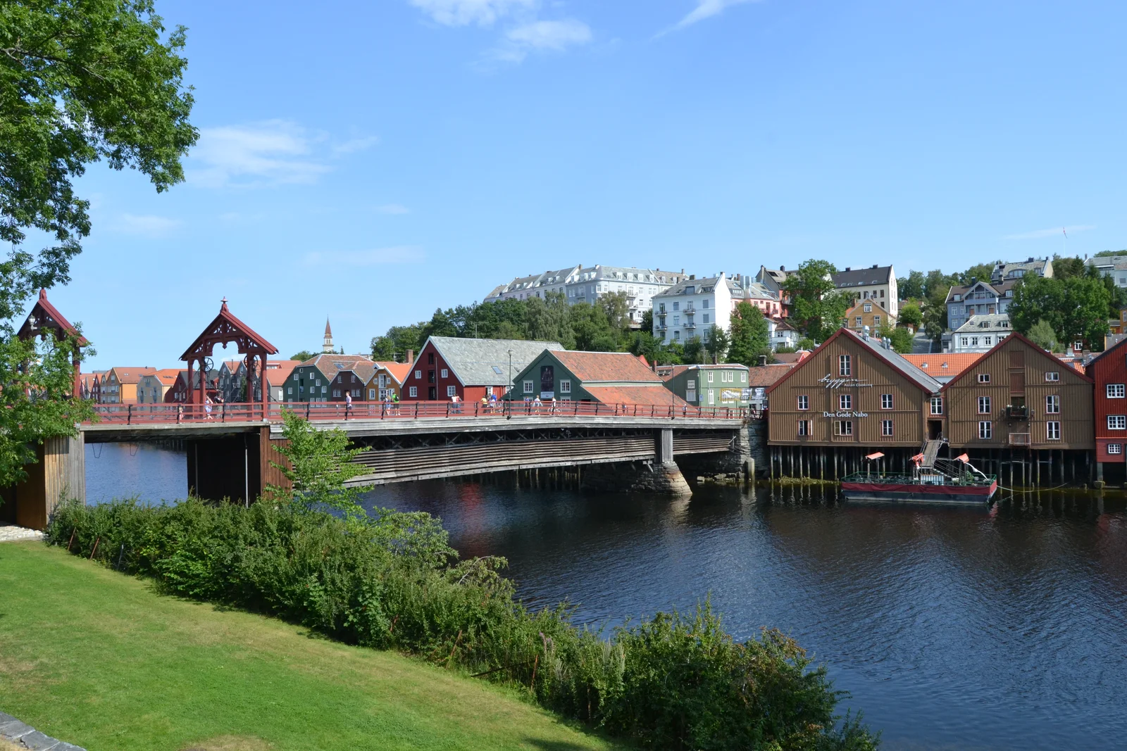 The red-painted portals of the Gamle Bybro old town bridge leading into Bakklandet in Trondheim