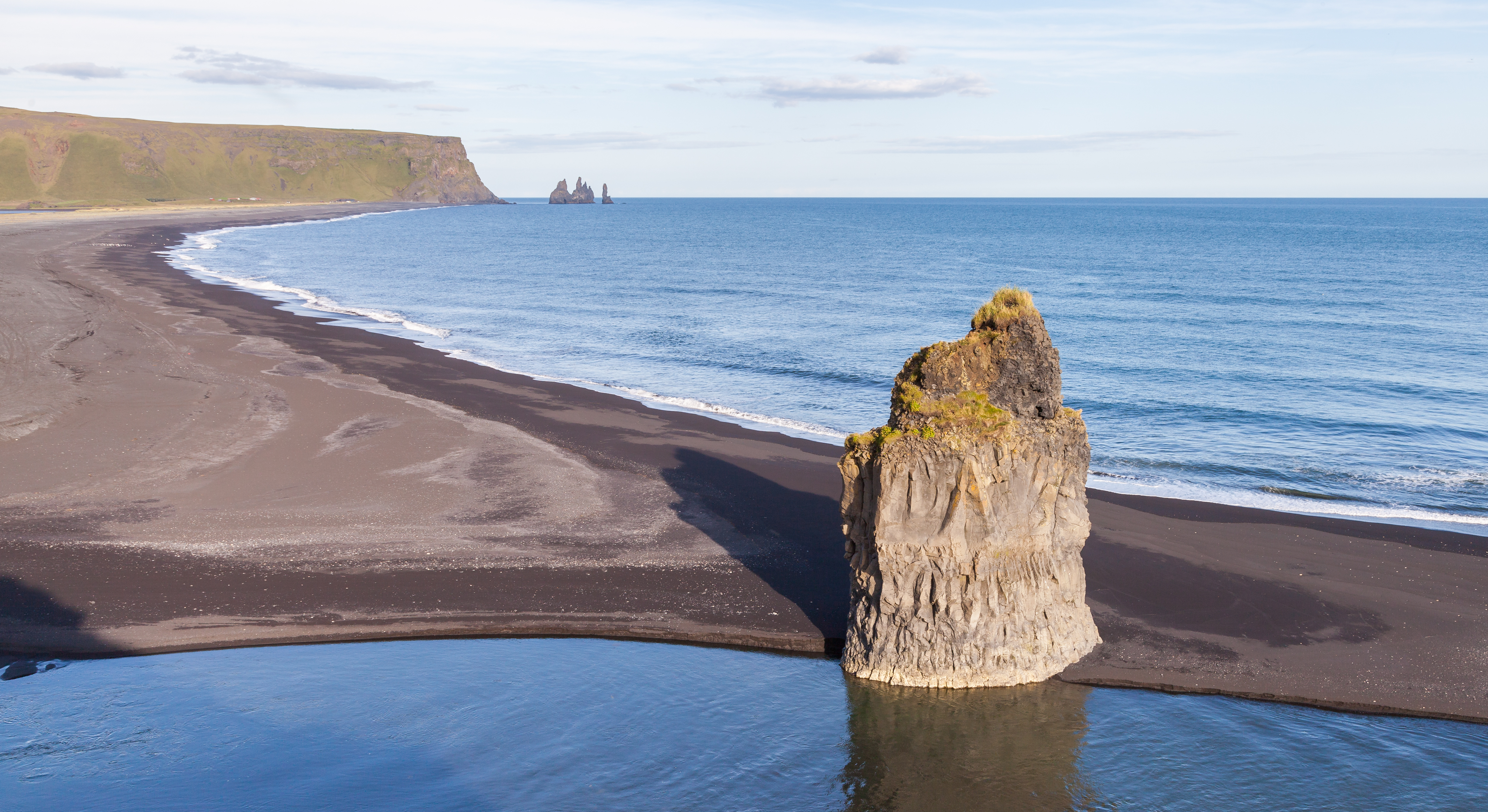 Reynisfjara black sand beach near Vík, Iceland, with its dramatic basalt columns and sea stacks