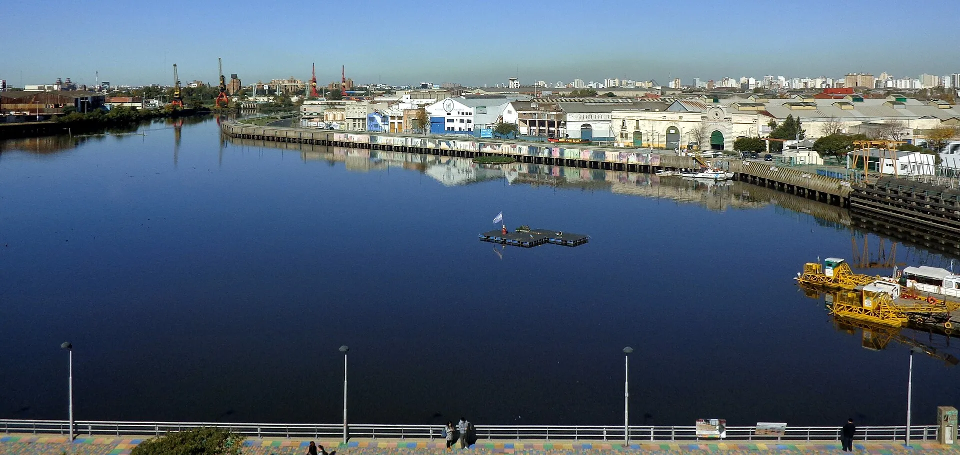 The Riachuelo river at the Vuelta de Rocha bend in La Boca with moored boats