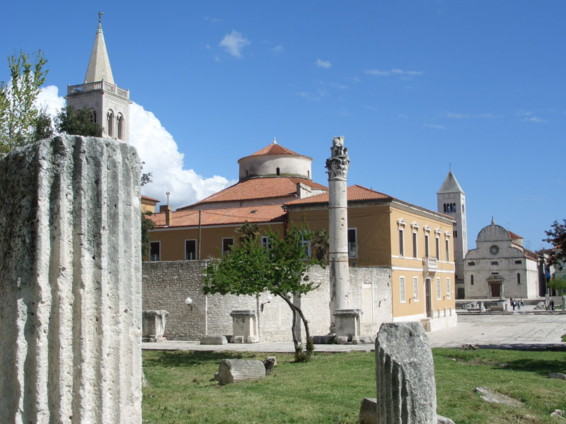 The ancient Roman Forum of Zadar with its 3rd-century CE column standing beside the Church of St Donatus, one of the best-preserved Carolingian-era circular churches in Europe