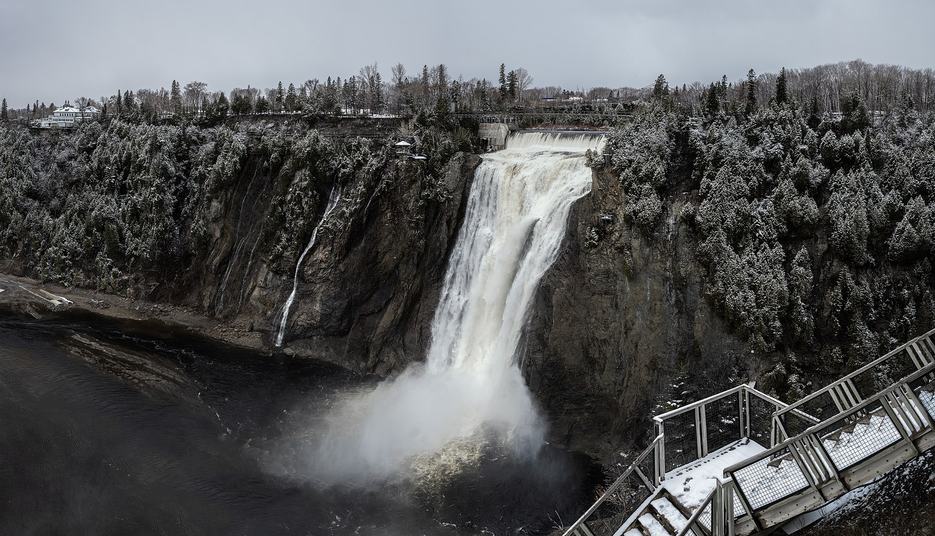 Panoramic view of Montmorency Falls and surrounding park near Quebec City