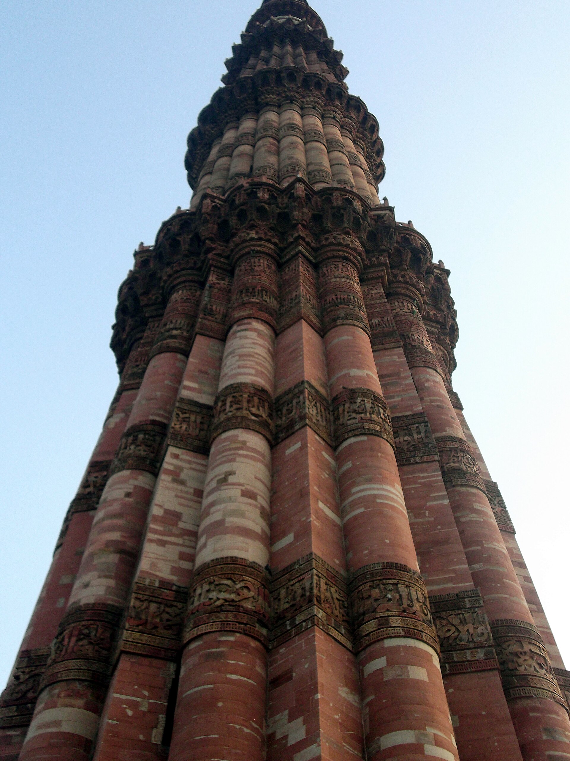 The 72.5-meter Qutub Minar tower rising above the Qutb complex in Delhi