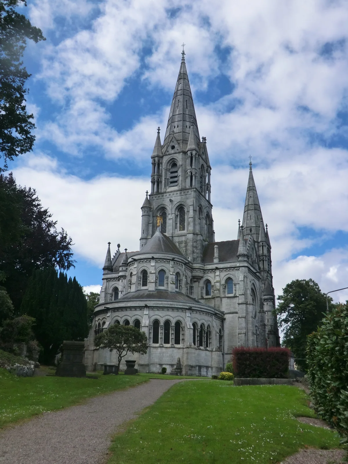The triple-spired Gothic Revival facade of Saint Fin Barre's Cathedral in Cork