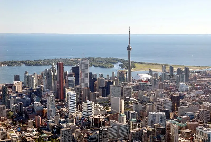 Toronto skyline at dusk with the CN Tower and Lake Ontario