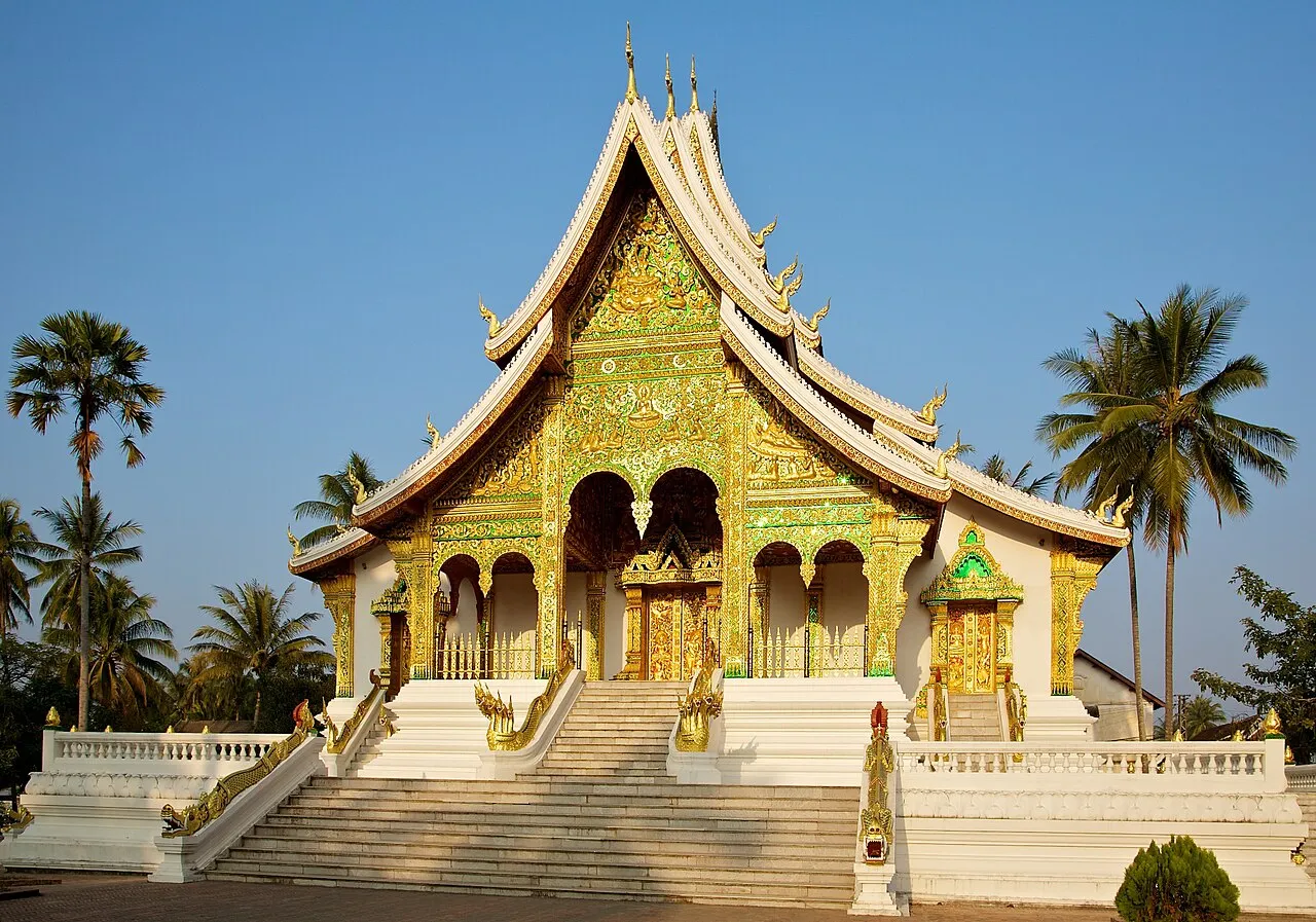 The Royal Palace Museum entrance facade in Luang Prabang with formal gardens