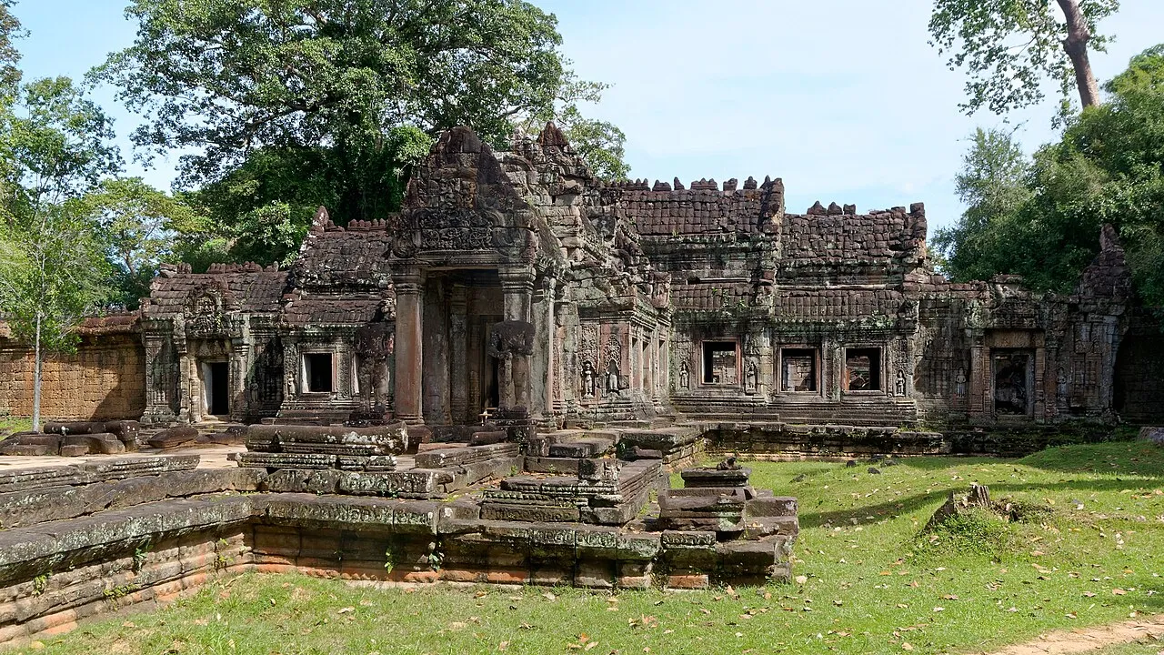 Stone doorway corridors of Preah Khan temple with tree roots and carved detail at Angkor