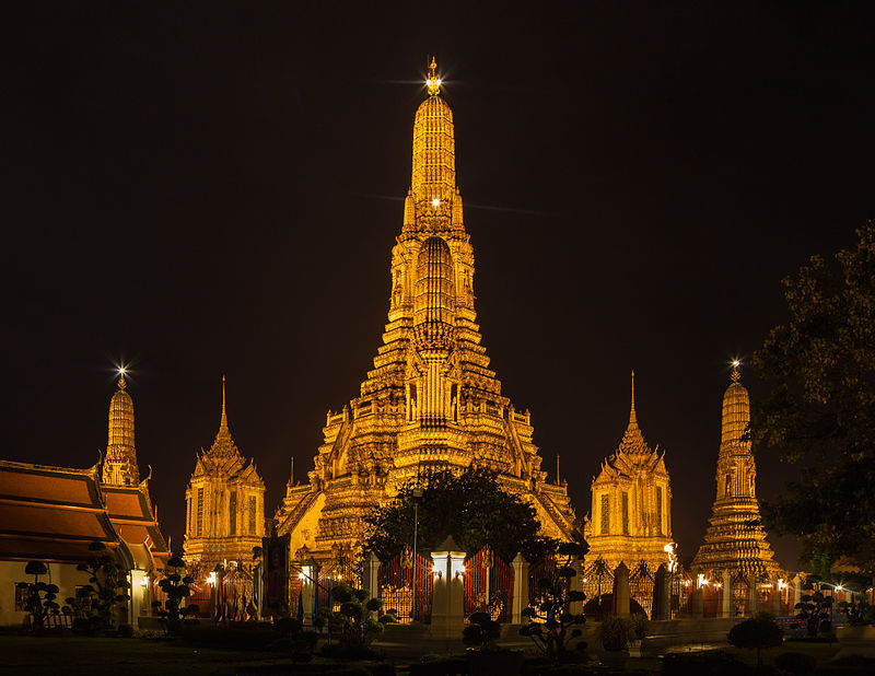 Wat Arun temple illuminated at night in Bangkok