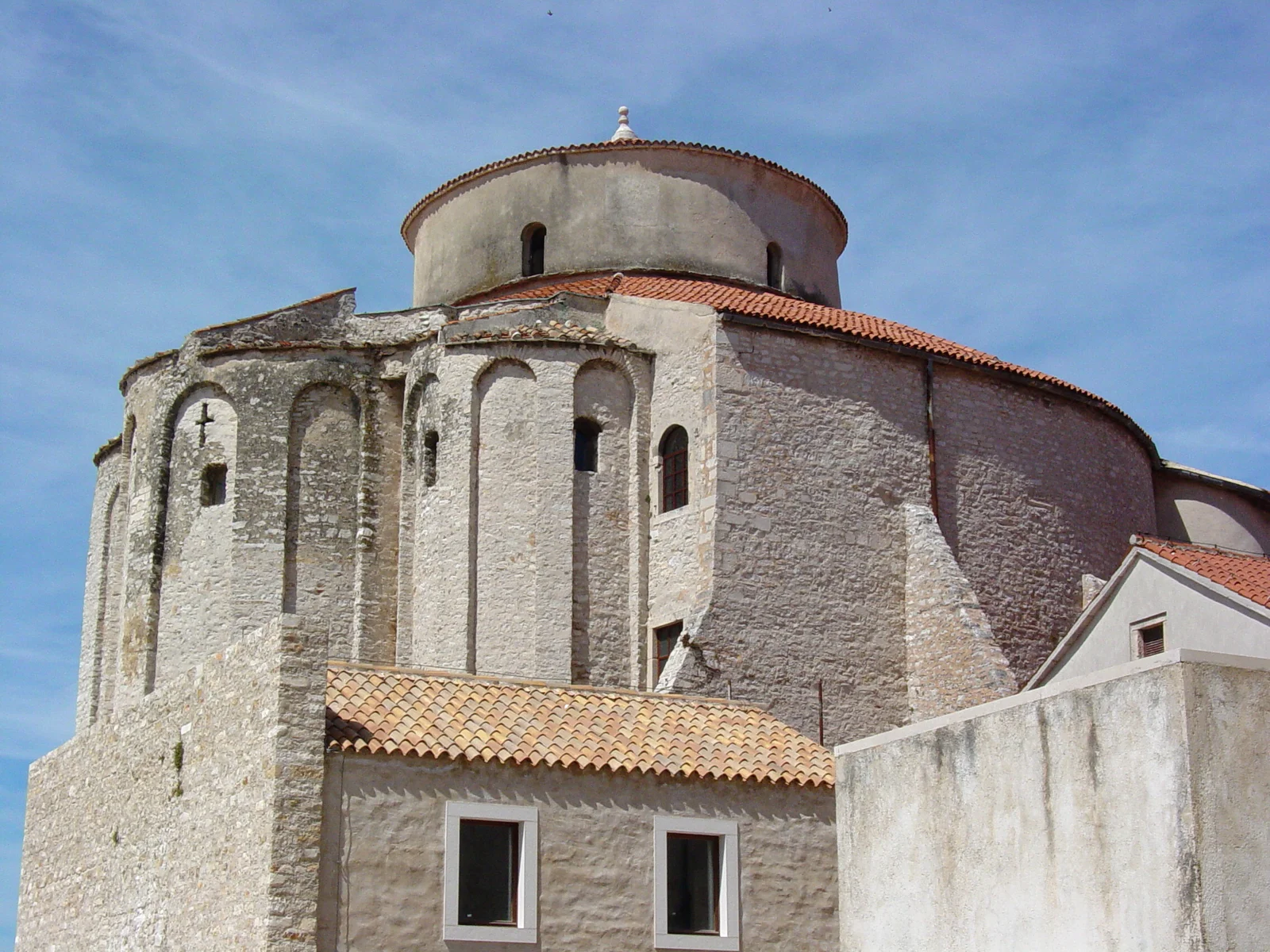 The tall cylindrical pre-Romanesque Church of St Donatus in Zadar, standing on the paving of the Roman Forum beside its bell tower