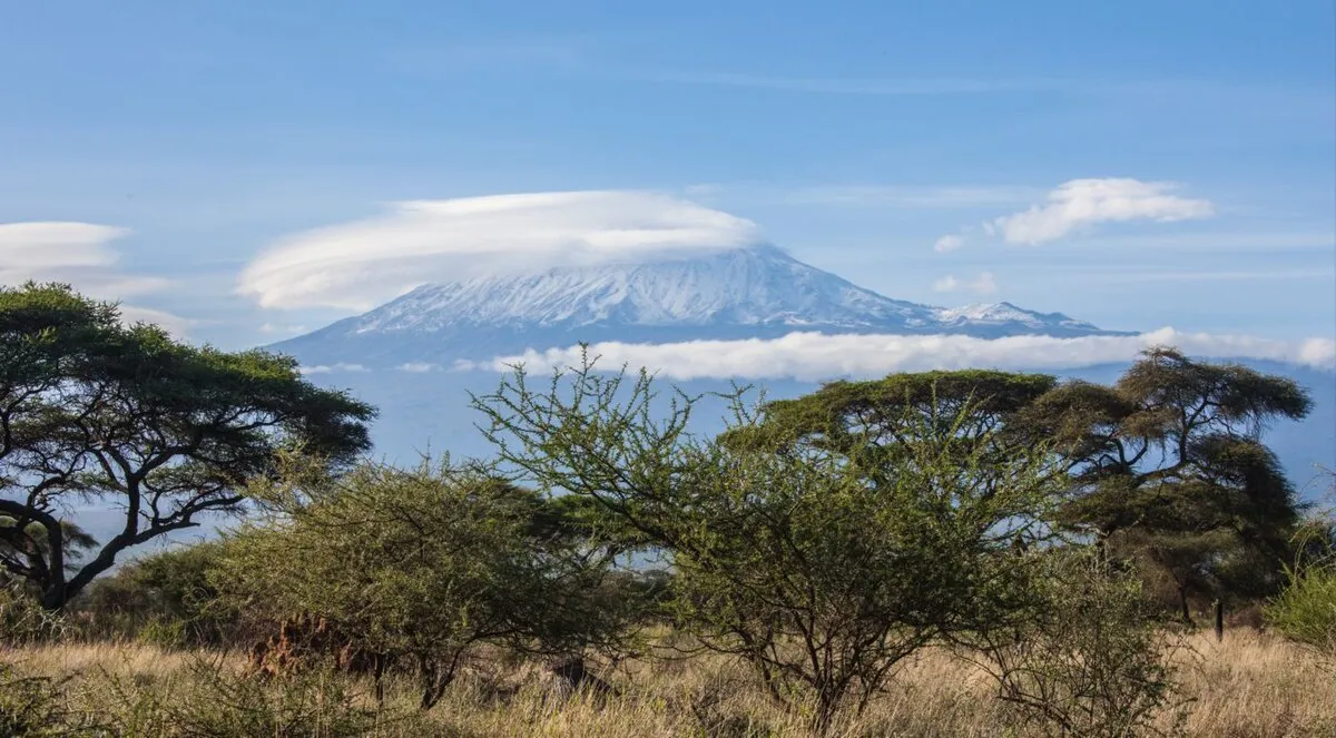 Mount Kilimanjaro rising above the plains of Amboseli, Africa's highest summit