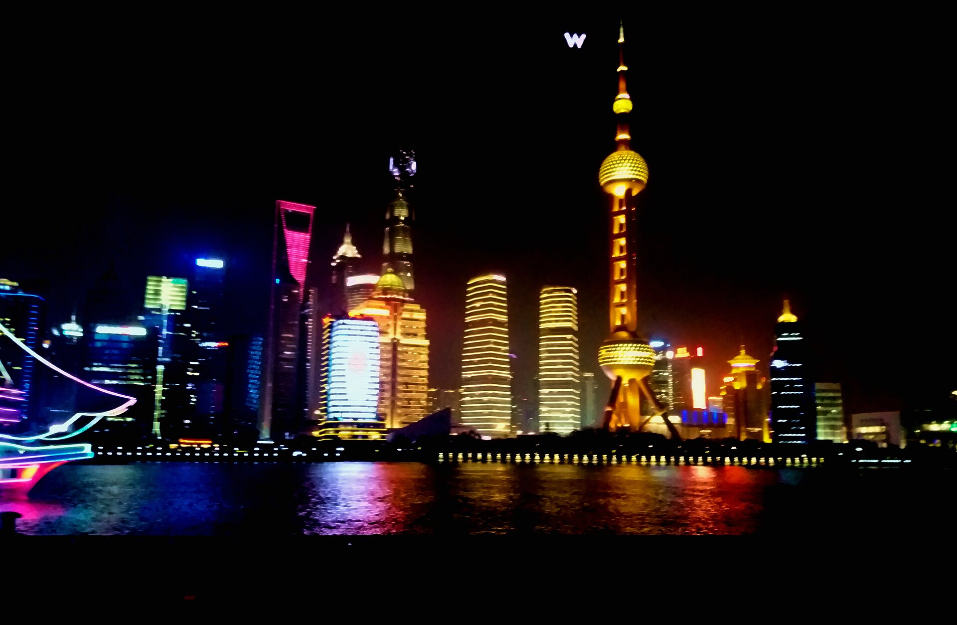 Historic colonial buildings along the Bund waterfront in Shanghai at night