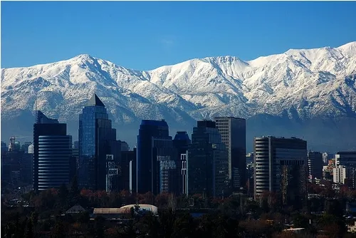 Santiago de Chile panoramic city view with Andes mountains forming a dramatic backdrop on a winter day